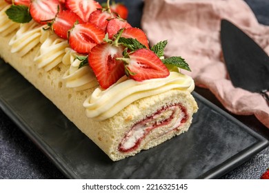 Board With Tasty Strawberry Roll Cake, Closeup