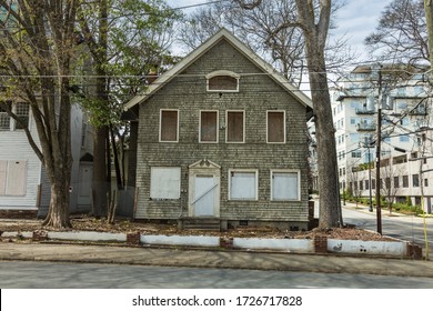 Boarded Up Abandoned House In Urban Atlanta Off Street