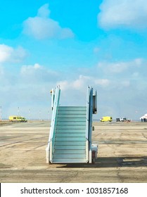  a boarding steps on the runway in sunny weather