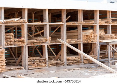 Boards Of Wood Are In The Building Materials Warehouse