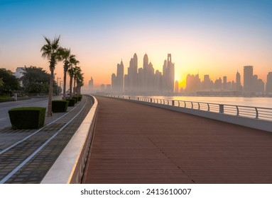 Boardwalk in the morning of Dubai Palm at sunrise, UAE - Powered by Shutterstock