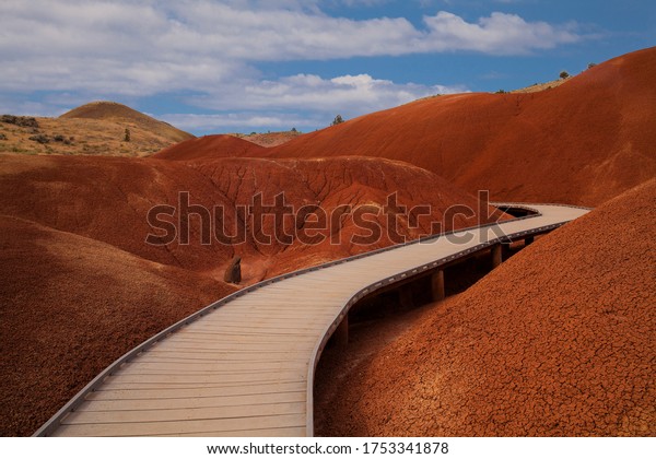 Boardwalk for the scenic Painted\
Cove trail in the Painted Hills located in Wheeler County,\
Oregon