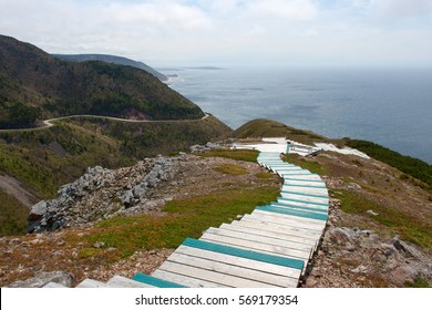 Boardwalk at the seaside and mountain highway along the ocean (Cabot Trail, Nova Scotia)