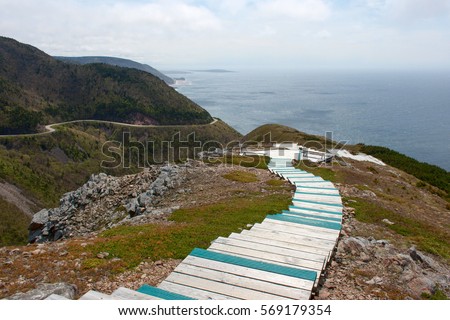 Boardwalk at the seaside and mountain highway along the ocean (Cabot Trail, Nova Scotia)