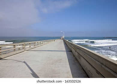 Boardwalk And Surf In Southern California.