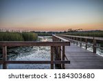 boardwalk through the Wye Marsh at sunset on summer evening