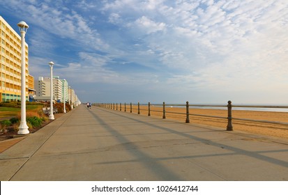 The Boardwalk of Virginia Beach at Sunrise. The Boardwalk is 28-feet wide and stretches three miles along the Virginia beach.