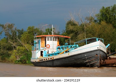 Boat Anchored On The Banks Of The Parana River, Rosario, Argentina