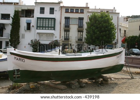Boat and architecture of Cadaques, Spain