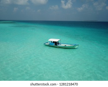 Boat At Atoll Baa