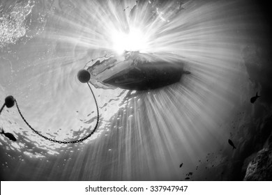 Boat Chain Anchor From Underwater In Black And White