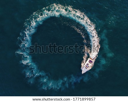 boat circle in mediterranean sea - italy