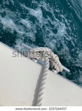 Boat cleat with rope knot on a boat