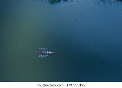 Boat Coxed Four Rowers Rowing On The River Aerial Drone Top View