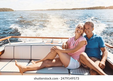 Boat, cruise and relax with mature couple at sea together for holiday, getaway or vacation for anniversary. Ocean, smile or travel with happy man and woman on yacht for bonding, romance or voyage - Powered by Shutterstock