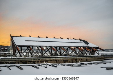 Boat Docks By The Frozen Mjøsa Lake In Gjøvik, Norway During Winter