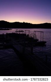 Boat Docks And A Purple Sunset Over Lake Arrowhead, California