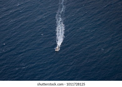 Boat excursion at ocean from above