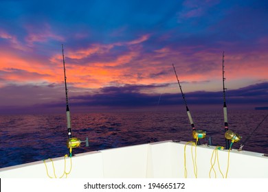 Boat Fishing Trolling At Sunset Big Game With Rods And Reels In Saltwater