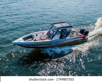 Boat Full Throttle Down The Lake