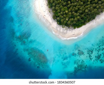 Boat Landing On Beach In The Mentawai Islands