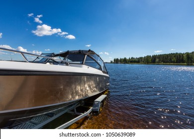 Boat Launch On Lake Water From Trailer