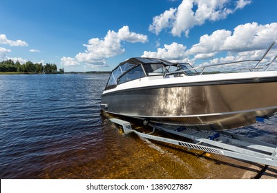 Boat launch on lake water from trailer