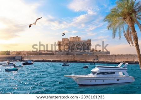 Boat in the Mediterranean in front of Citadel of Qaitbay, Alexandria, Egypt