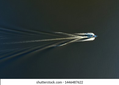 Boat Moving Fast Captured In Slow Shutter Speed