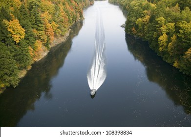 A boat navigates the Connecticut River on the Mohawk Trail of western Massachusetts, New England