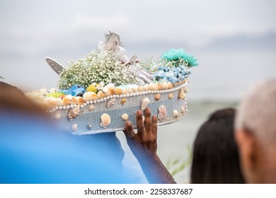 boat with offerings to iemanja, during a party at copacabana beach. - Shutterstock ID 2258337687