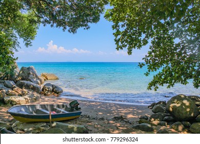 A boat on The beach in Perhentian Besar Island, Malaysia