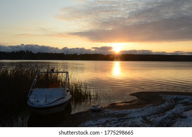 Boat on a lake and sunset
