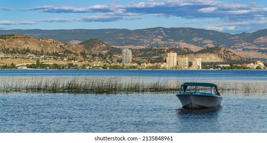Boat on Okanagan Lake and Kelowna