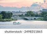 Boat on the Potomac River and Pentagon in the background - Washington, DC (USA)	