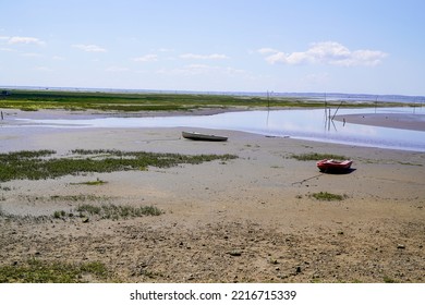 Boat On Sand Low Tide Beach Sea Coast In Atlantic Ocean In Ares City In Arcachon Bay In France