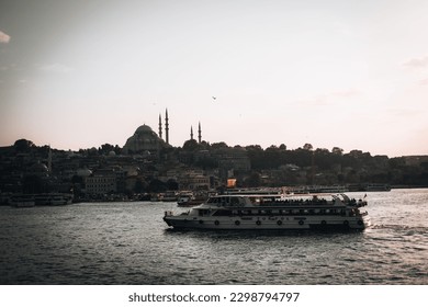a boat on the water in front of a city, a tilt shift photo by Kerem Beyit, featured on unsplash, dau-al-set, photo taken with ektachrome, photo taken with provia, photo taken with fujifilm superia