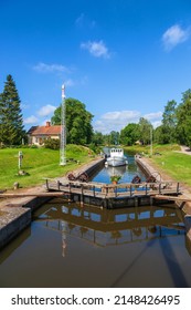 Boat On Its Way Into A Lock In The Göta Canal In Sweden