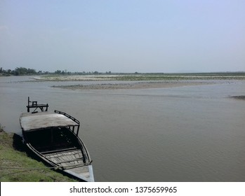 Boat Is The Only Mode Of Transportation For The People In This Part Of Beki River In Barpeta District Of Assam, India 