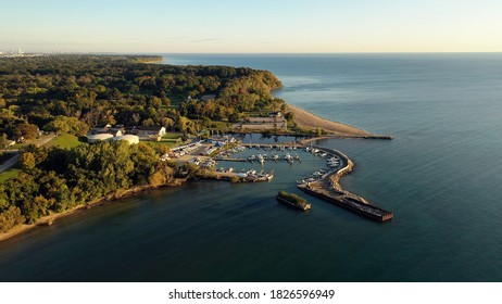 Boat Pier, Dock, Beach On The Shoreline Of Lake Michigan In Milwaukee Wisconsin