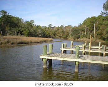 Boat Pier And Launch In Bayou At Park.