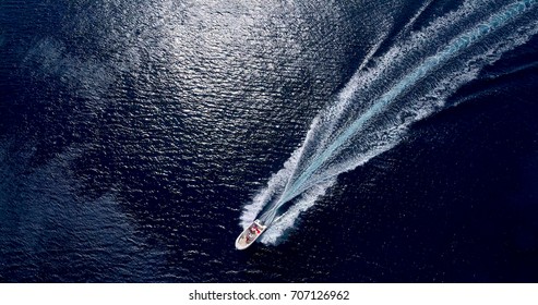 Boat At Sea Leaving A Wake