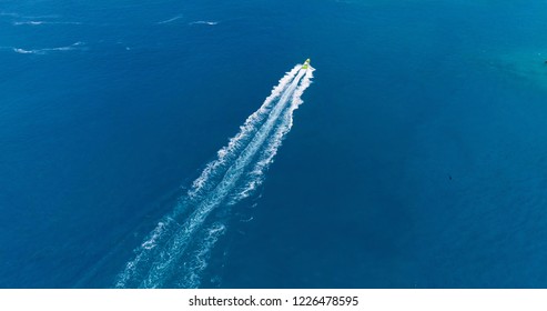 Boat At Sea Leaving A Wake, Aerial View