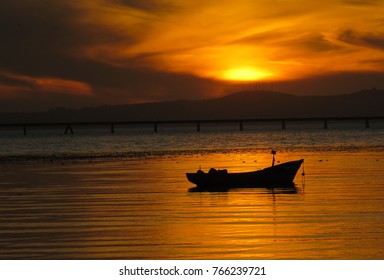 Boat In The Sea At Sunset
Lirquen, Concepción Chile, April 10, 2015