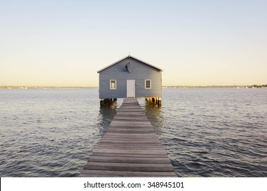 Boat Shed On The Swan River In Perth Western Australia With Australian Flag