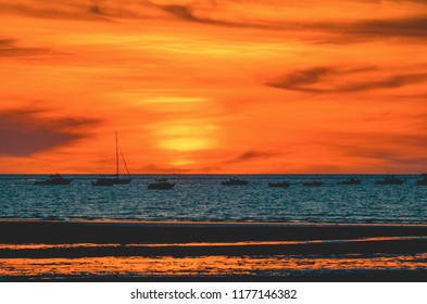 Boat Silhouettes During Sunset At Mindil Beach Near Darwin