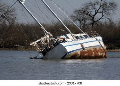 A Boat Sinking In The Lake