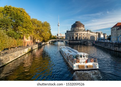 Boat tour along the Spree river in Berlin with Fernsehturm in the background and Museum island to the right - Shutterstock ID 1532059526