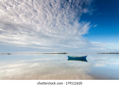 Boat under the clouds