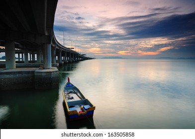 Boat Under The Penang Bridge